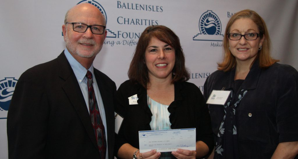 BICA Director Mark Freeman with Habitat For Humanity Chief Development Officer Amy Brand and grants writer Stacey deLucia
